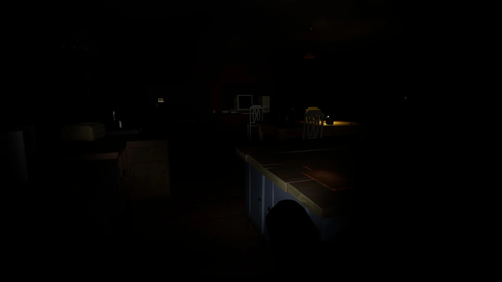 The apartment in near darkness after the lights go out